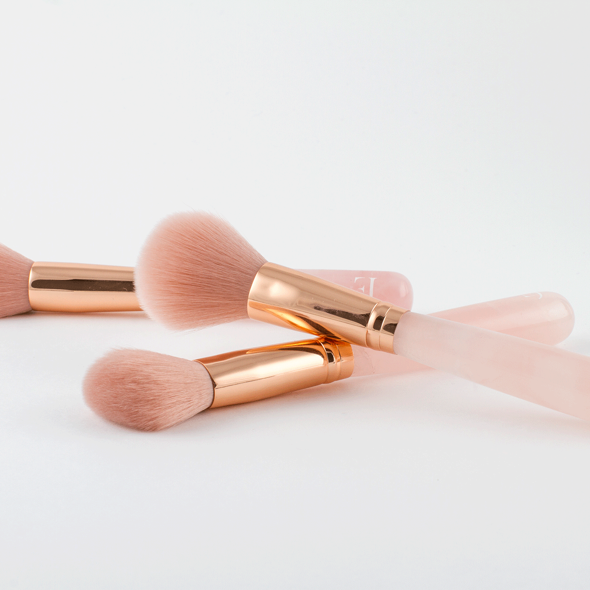 Rose quartz makeup brushes