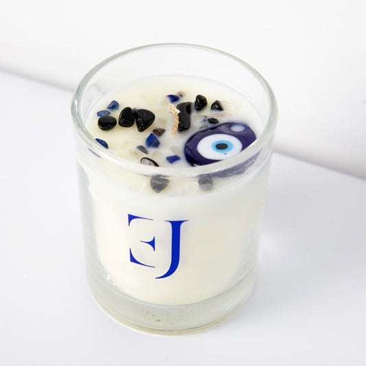 'Evil eye' scented candle with evil eye pendant & crystals